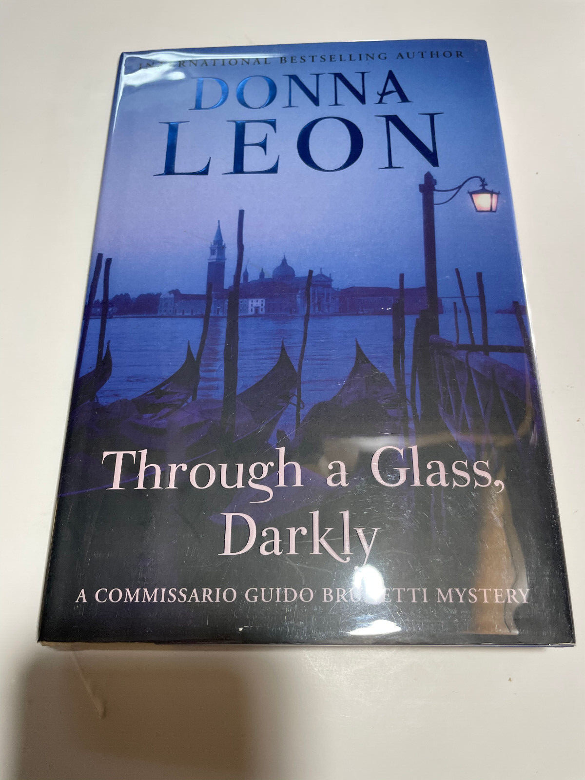 Signed Donna Leon: Through a Glass Darkly, signed 1st HB