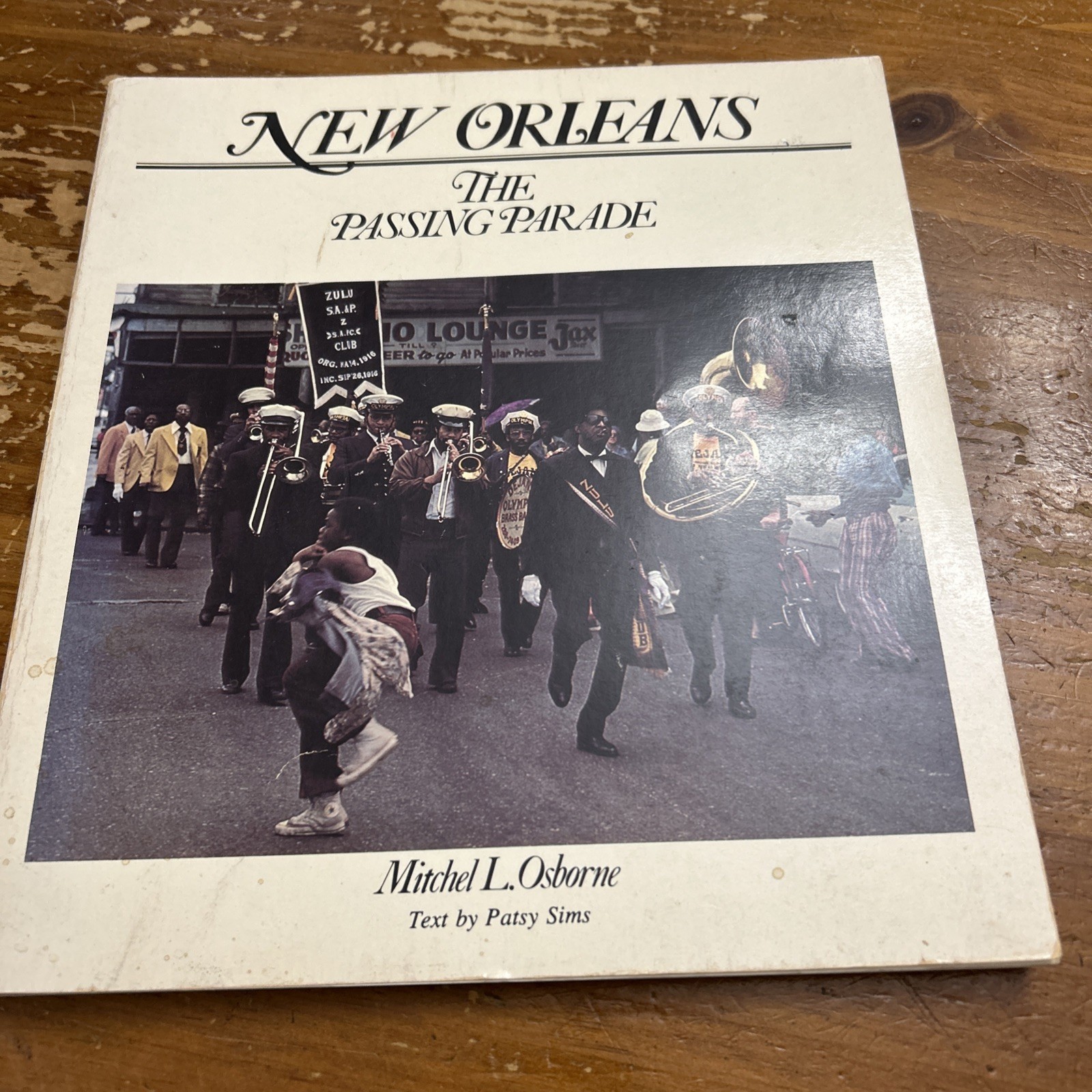 Photography by Mitchel L. Osborne NEW ORLEANS THE PASSING PARADE Patsy Sims