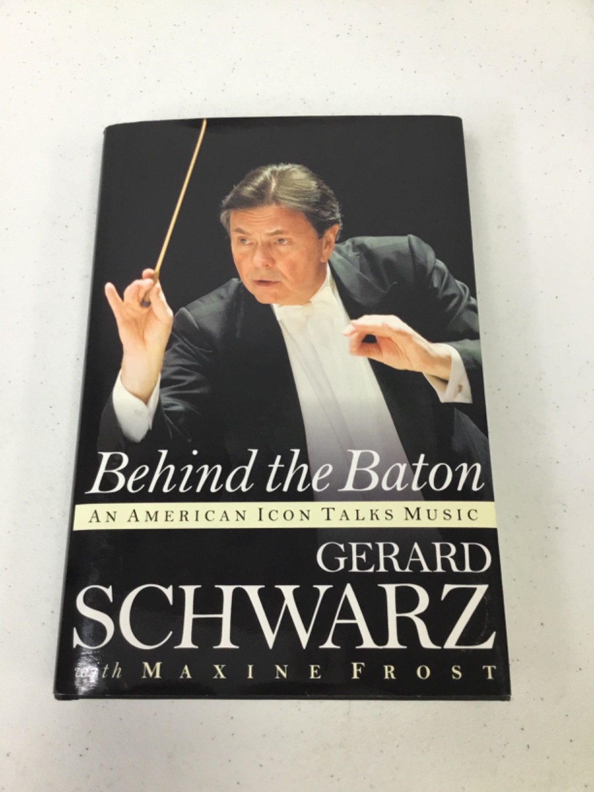 Behind the Baton. Schwarz. 2017 HCDJ, Signed, Illustrated