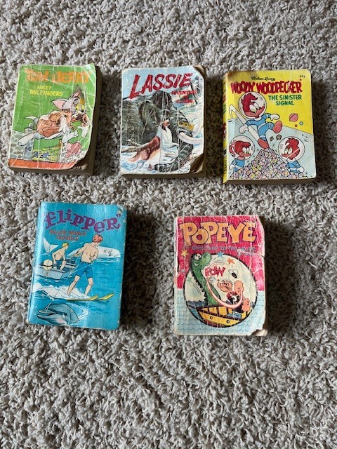 A Big Little Book group; Woody Woodpecker, Flipper, Lassie, Popeye, Tom & Jerry
