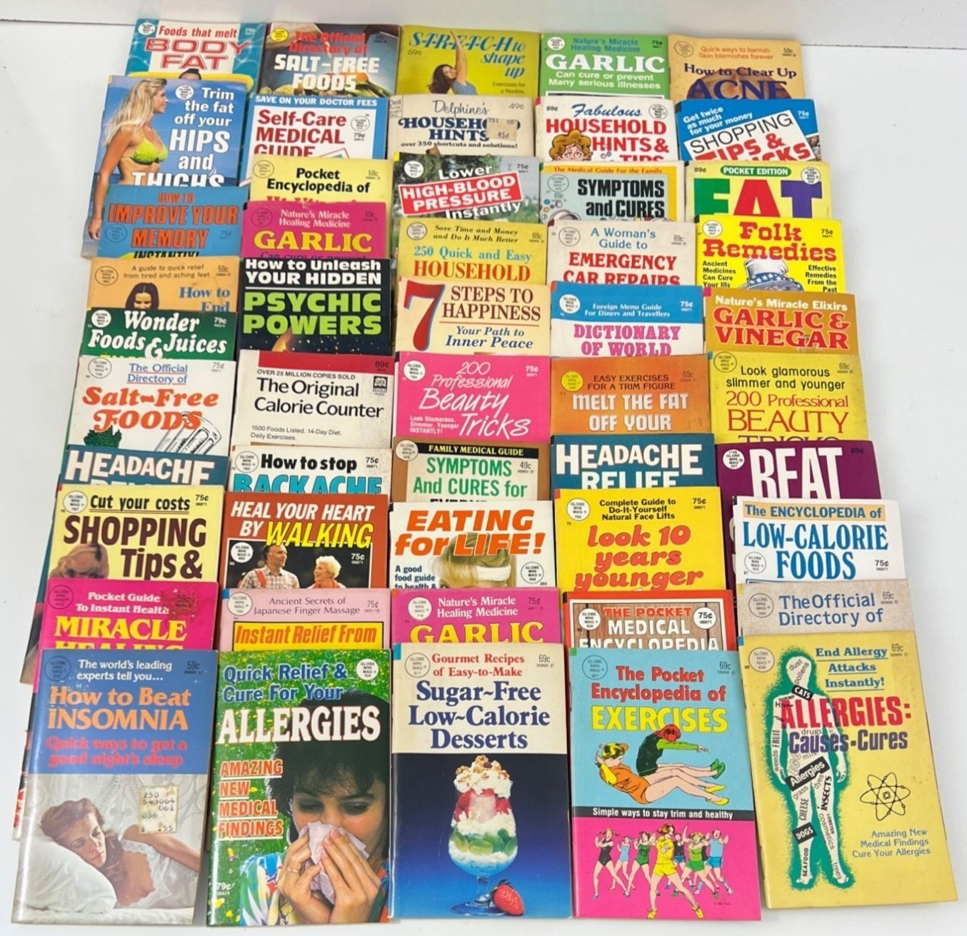 Lot of 50 Vintage Globe Mini Mag & Dell Purse Books Health Diet Stress Shopping