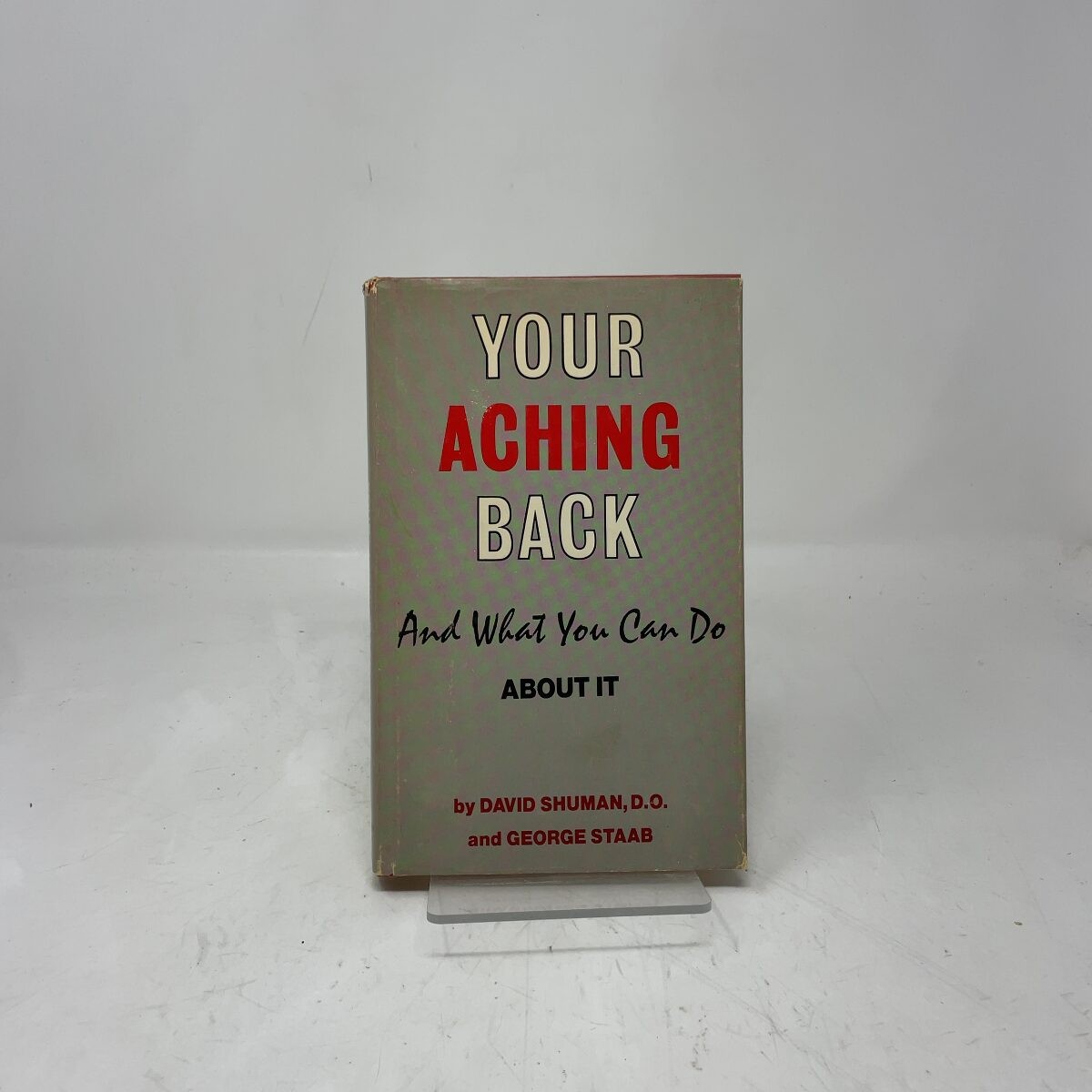 Your Aching Back and What You Can Do About It by David Shuman, D.O. and George S