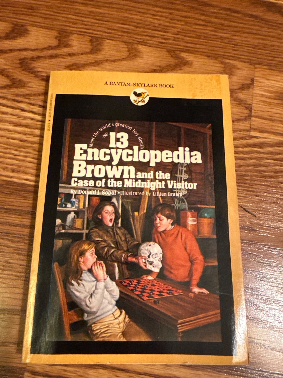 ENCYCLOPEDIA BROWN AND THE CASE OF THE MIDNIGHT VISITOR BY DONALD J. SOBOL 1977