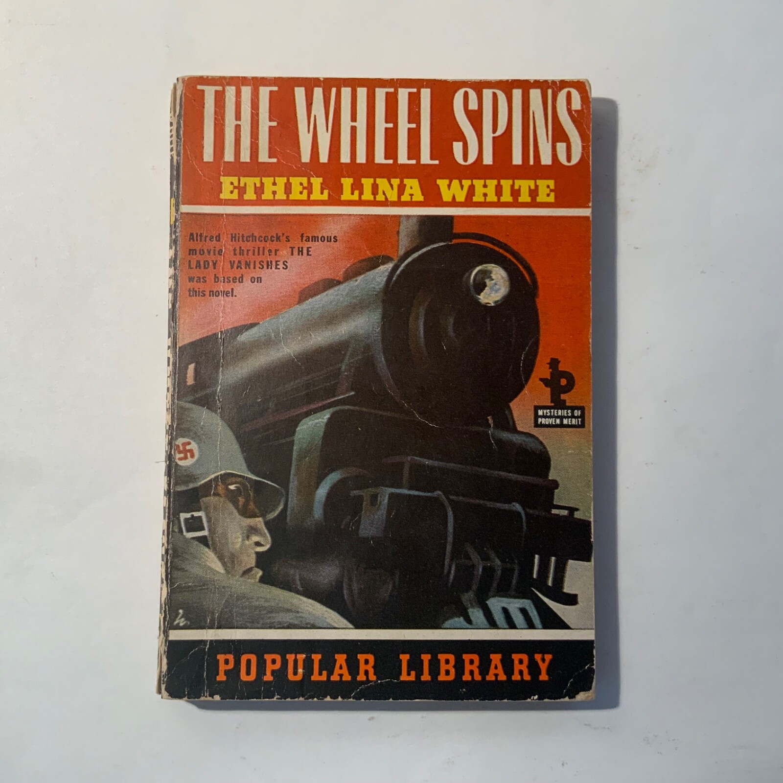 The Wheel Spins (a.k.a. The Lady Vanishes) by Ethel Lina White 1944 Pop Lib 32