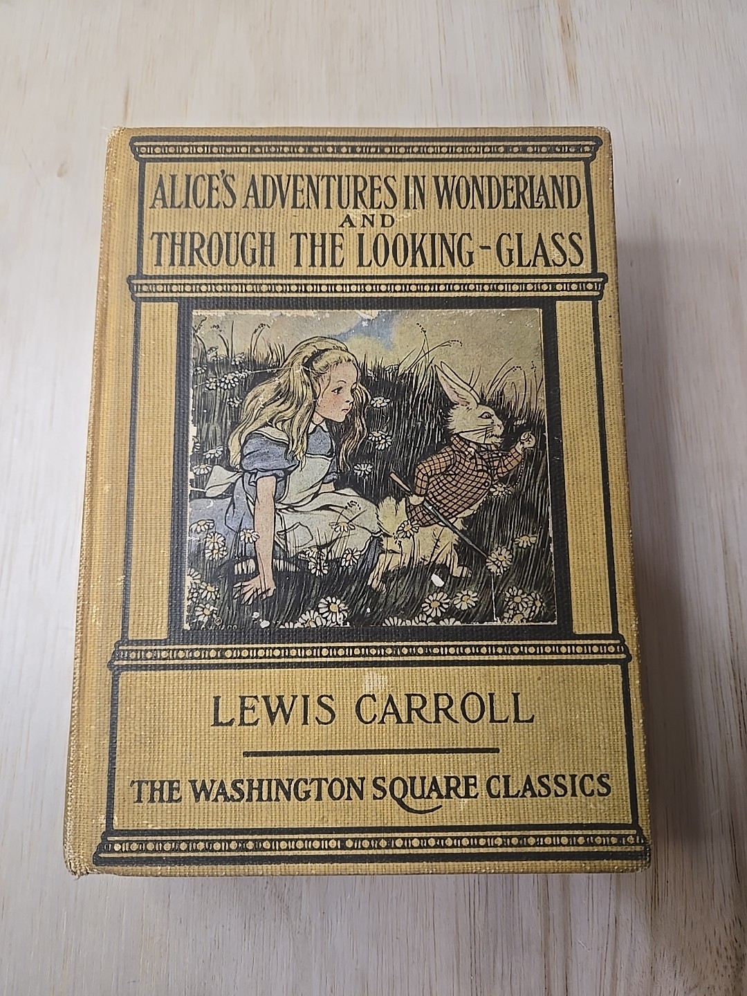 Alice’s adventure in wonderland and through the looking glass by Lewis Carroll