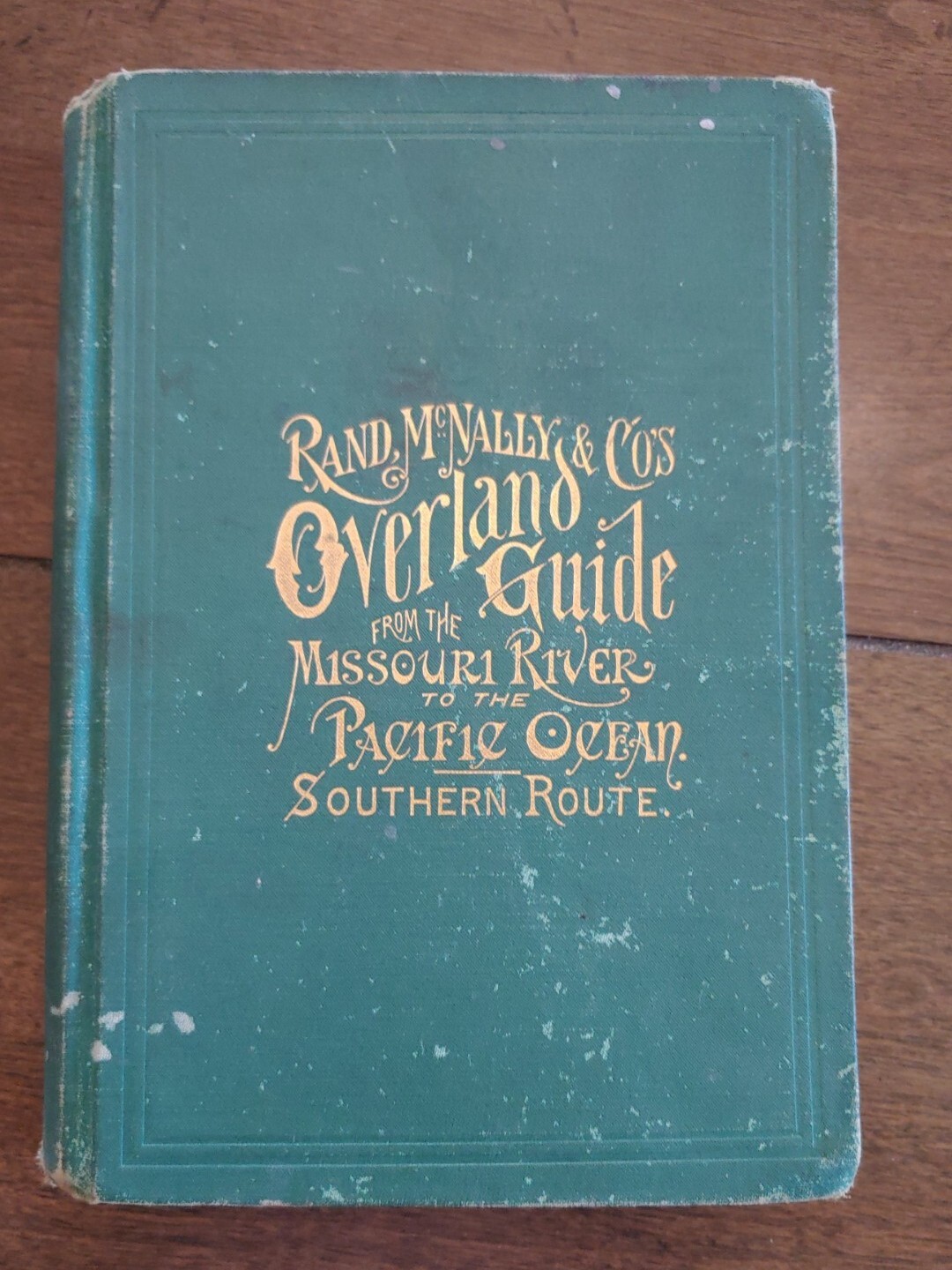 Rare 1885 Rand McNally & Co.’s Overland Western guide with folding colored Map