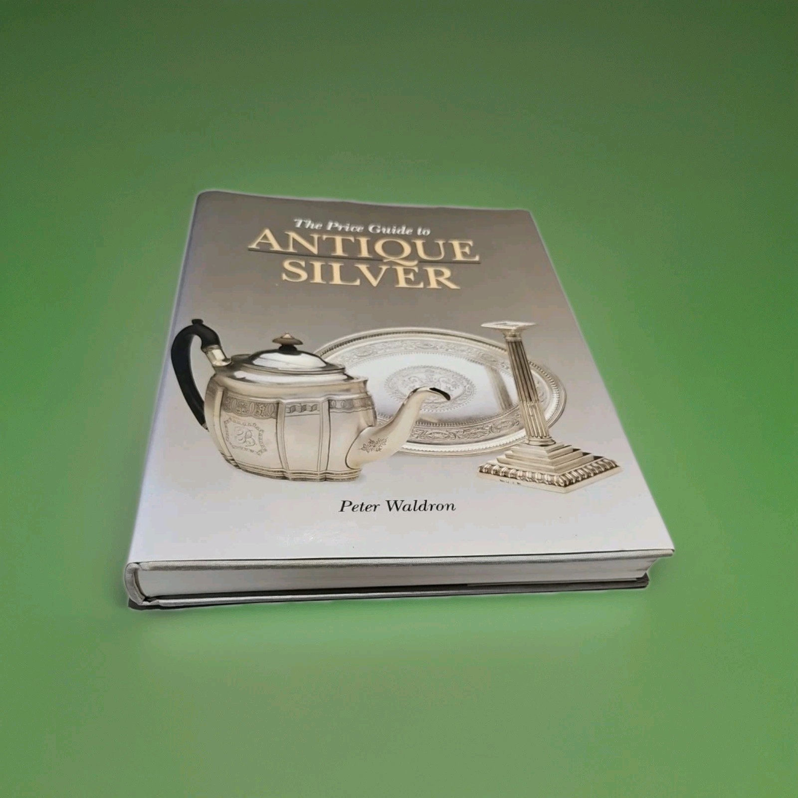 HARDCOVER BOOK WITH DUSTCOVER THE PRICE GUIDE TO ANTIQUE SILVER BY PETER WALDRON