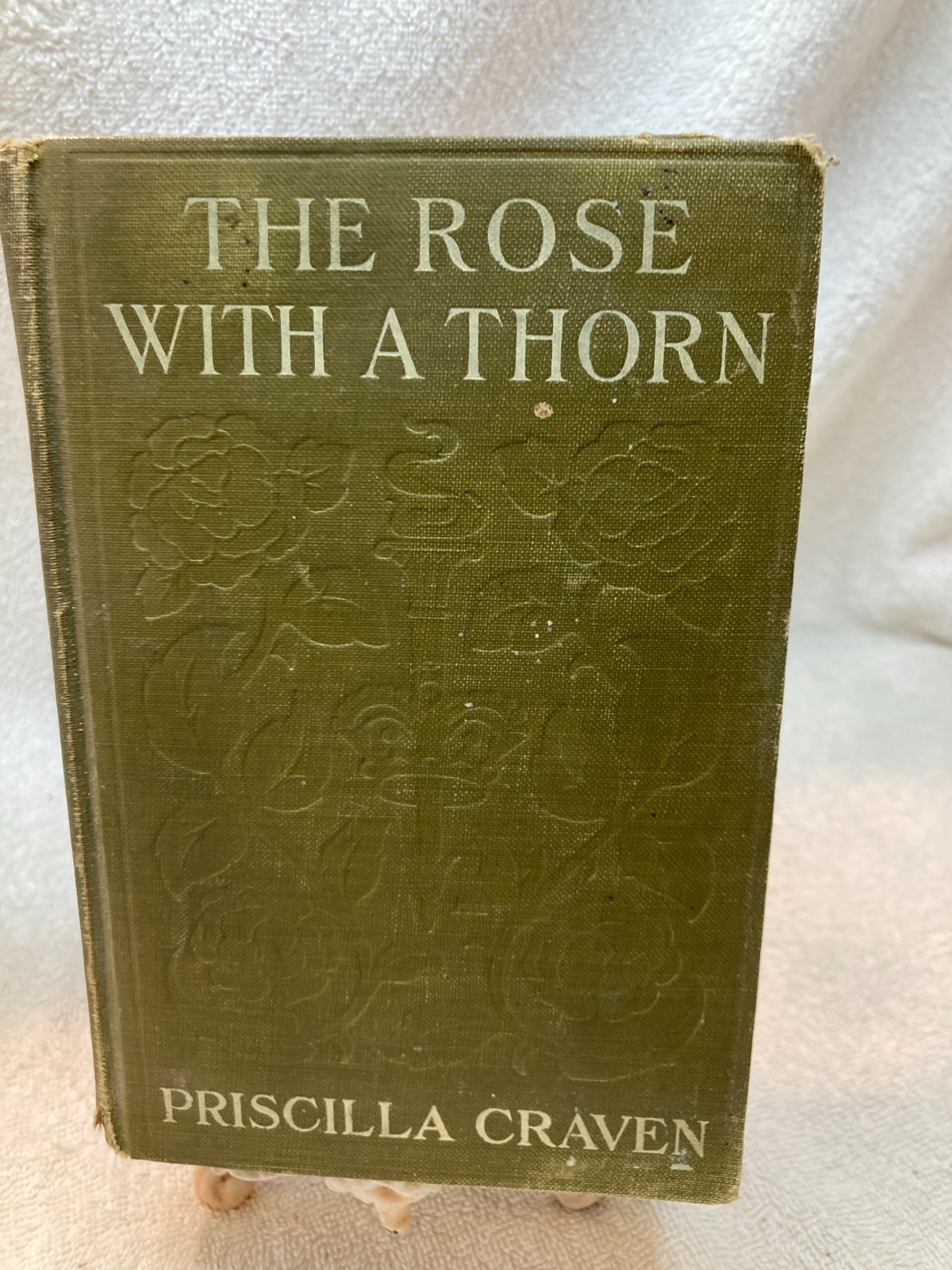 The Rose With A Thorn, Priscilla Craven – Olive Canvas Hardcover – Distressed