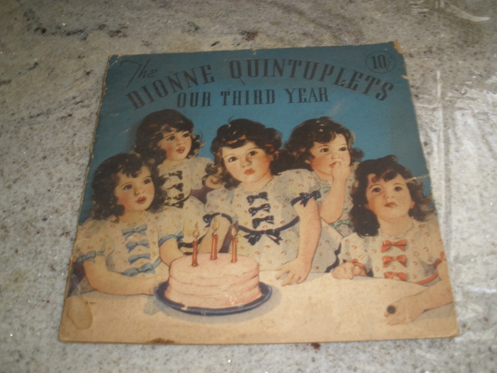 THE DIONNE QUINTUPLETS OUR THIRD YEAR PAPERBACK 1937 (D13)