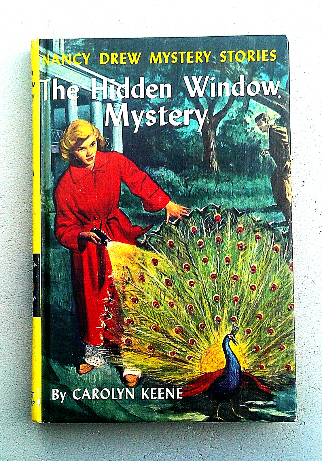 Nacy Drew „The Hidden Window Mystery “ HC Blue & White End pages UNREAD. Tight.