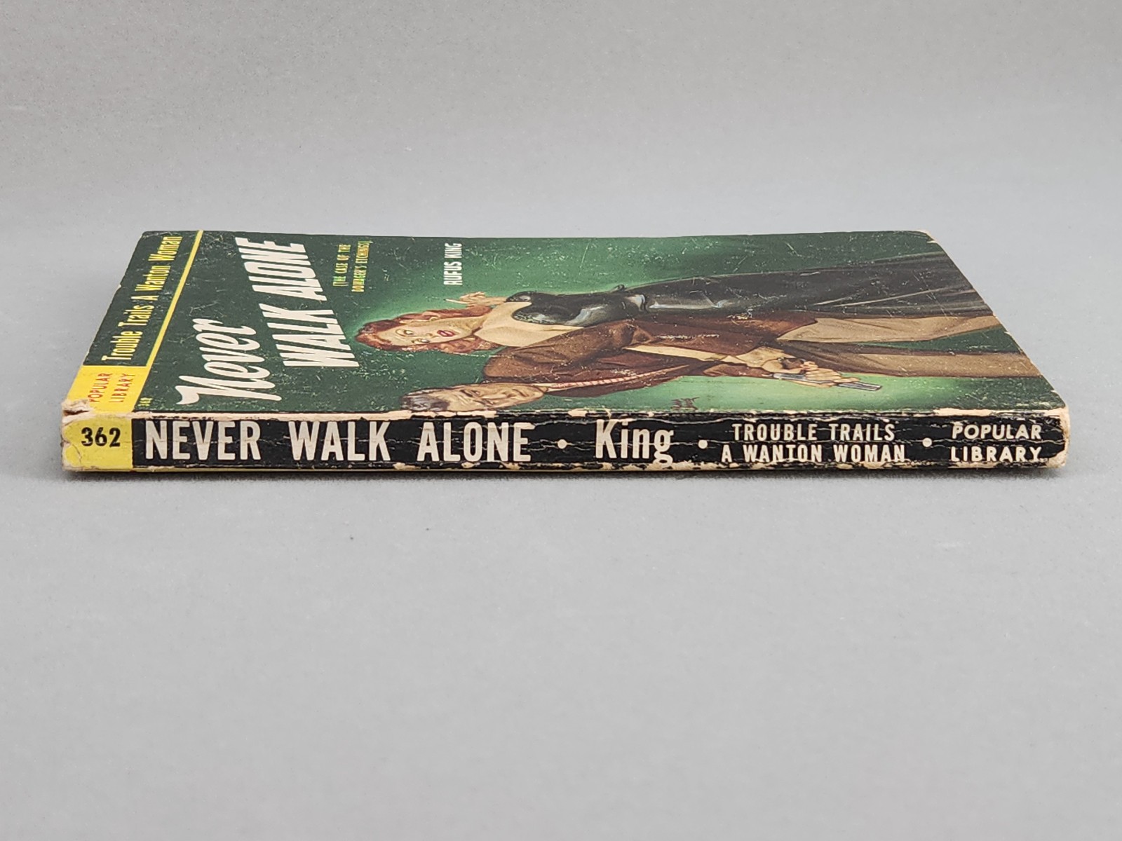 Never Walk Alone by Rufus King – Paperback – 1951 Popular Library