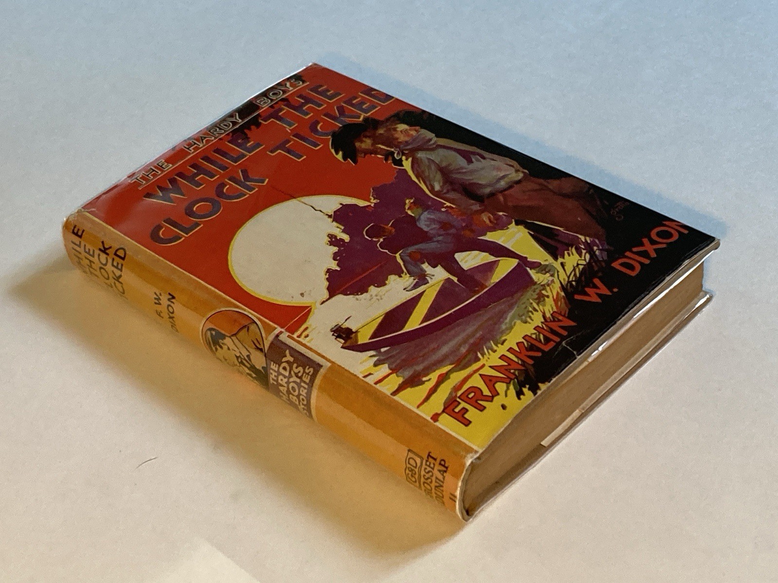 While the Clock Ticked by Dixon; 1932 Grosset & Dunlap Hardcover, VG / VG