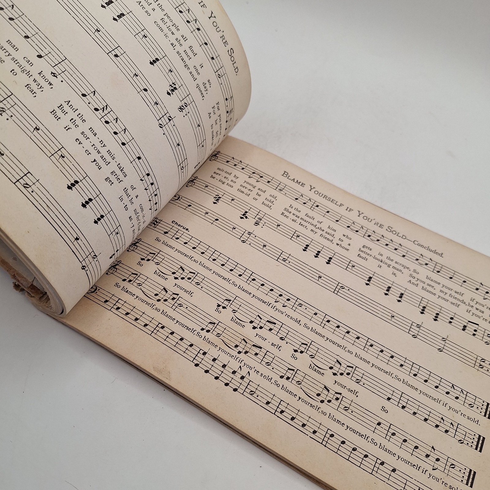 The CONQUEROR by Leslie & Randall ` 1880 HC Song book with Railroad Ads