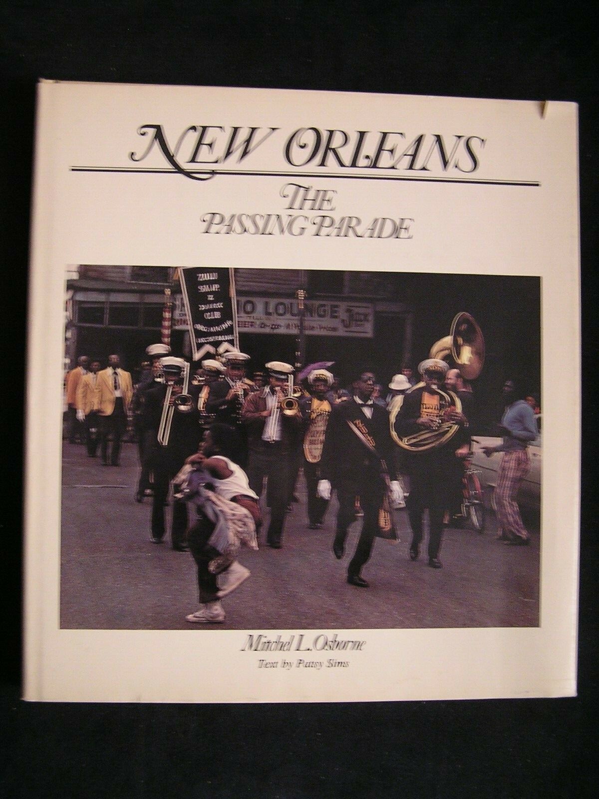 Photography by Mitchel L. Osborne NEW ORLEANS THE PASSING PARADE culture customs