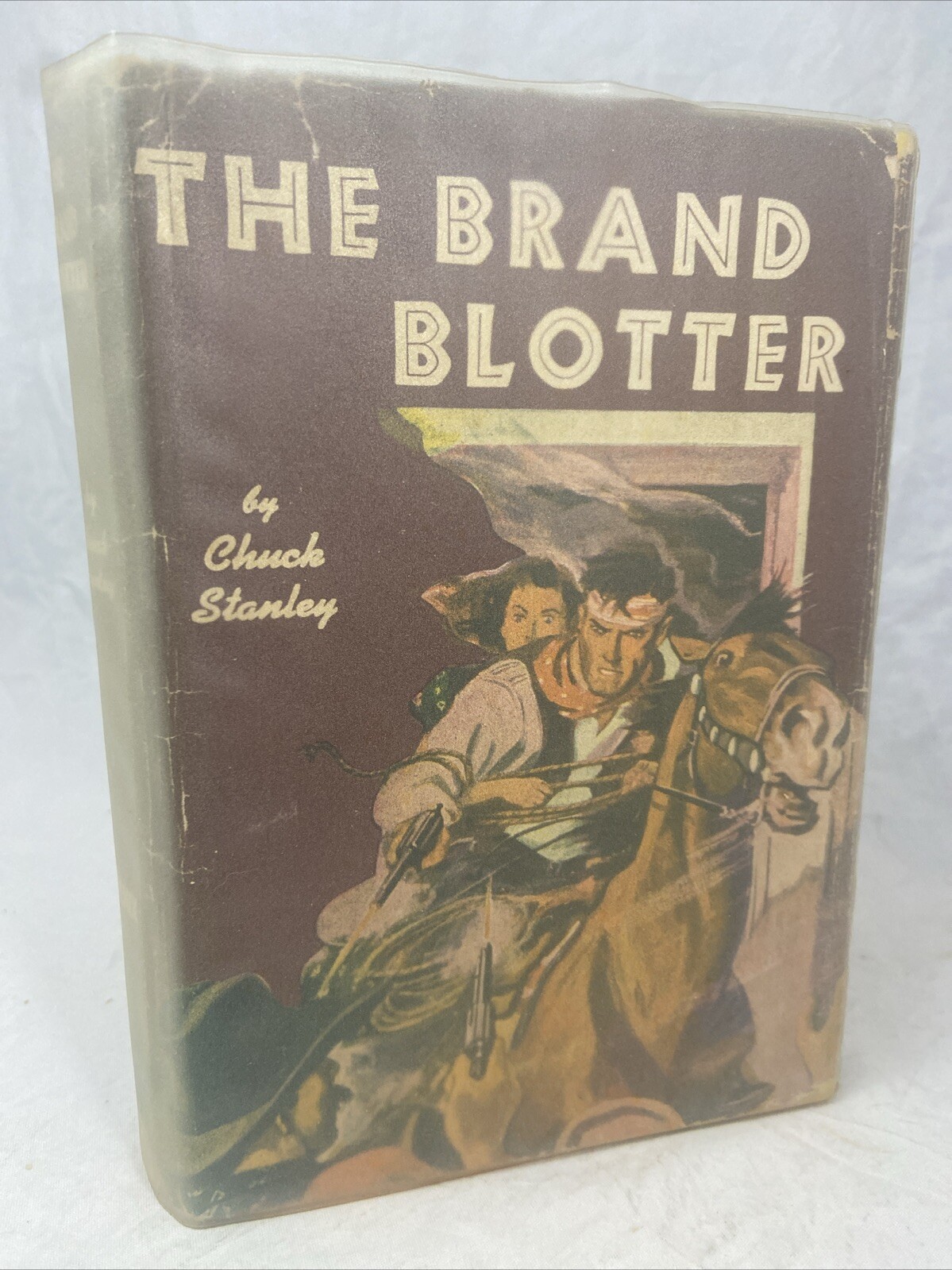 1948: The Brand Blotter by Chuck Stanley – Phoenix Press, HCDJ Western