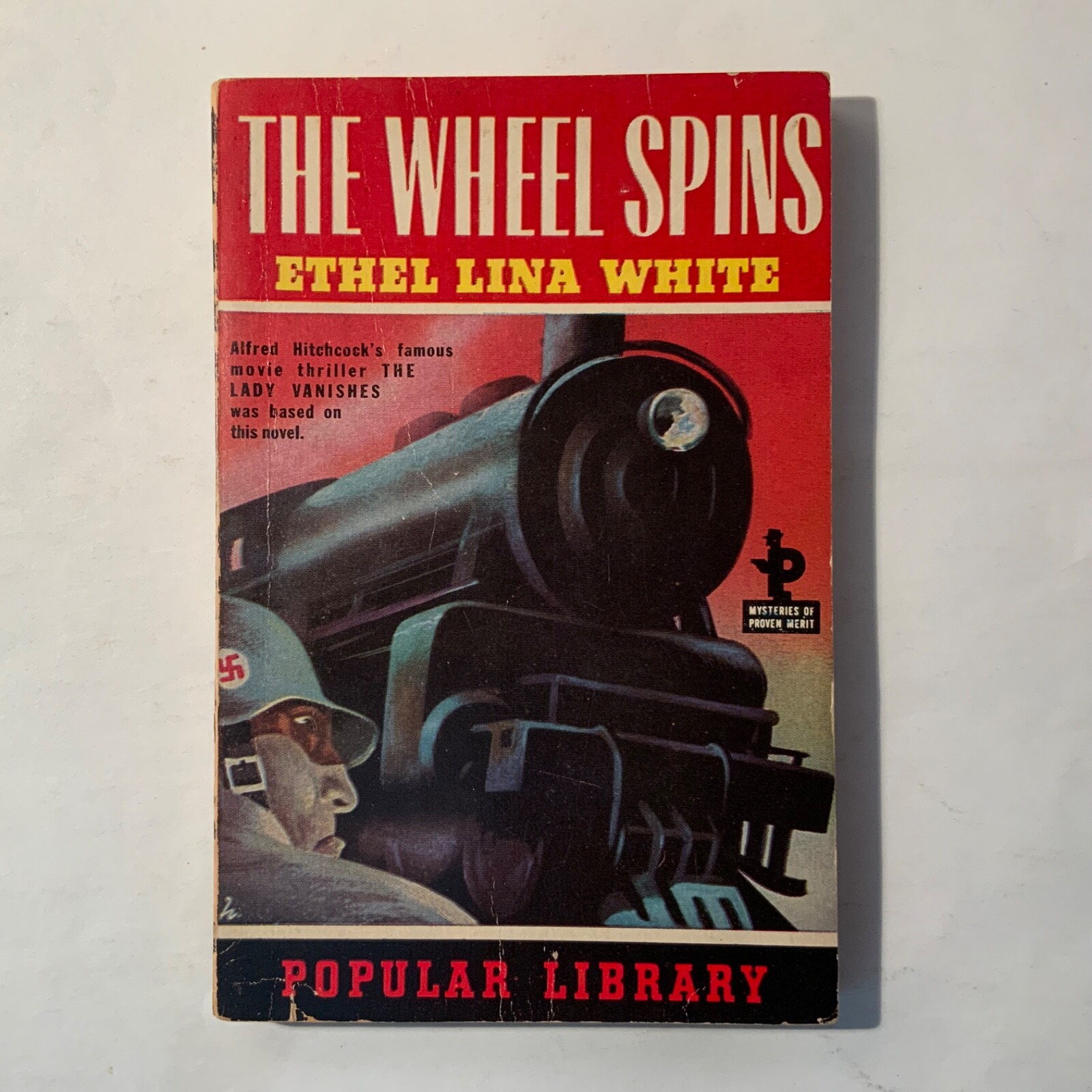 The Wheel Spins by Ethel Lina White 1944 Popular Library / Canada – Near Fine