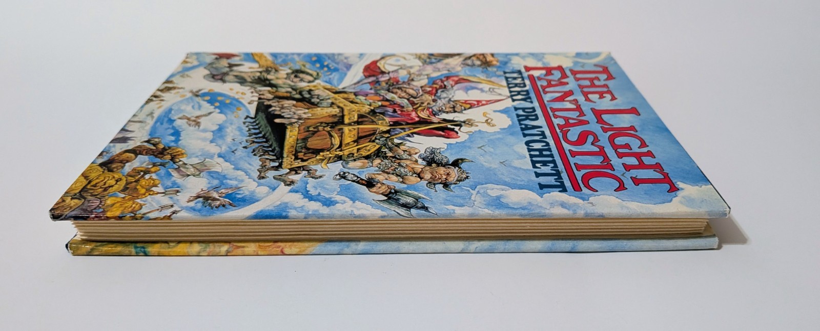 Pratchett THE LIGHT FANTASTIC 1st Printing HCDJ 1986 – w/ Issue Points Near Fine
