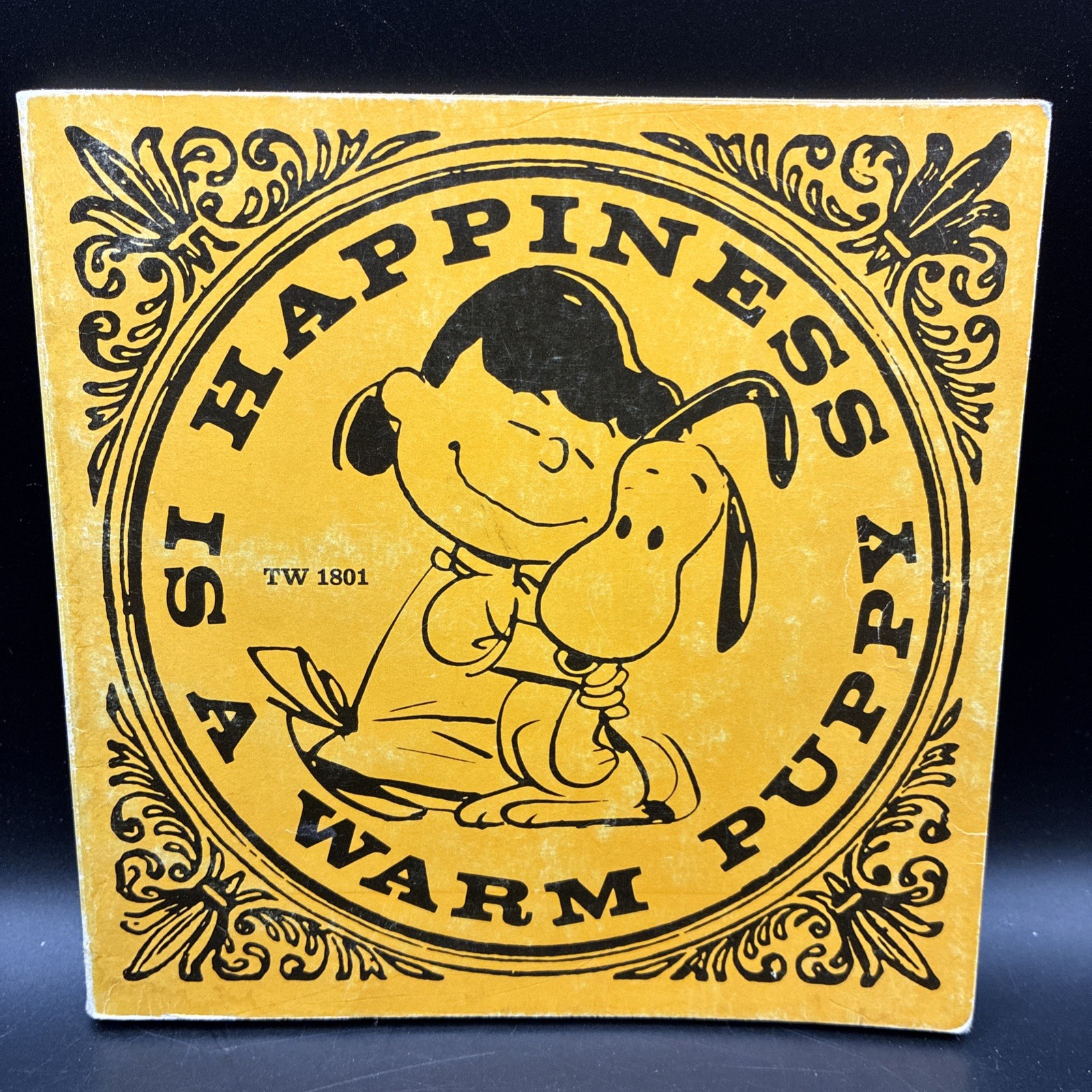 Happiness is a Warm Puppy by Charles M. Schulz, 1st printing Nov 1970 Scholastic