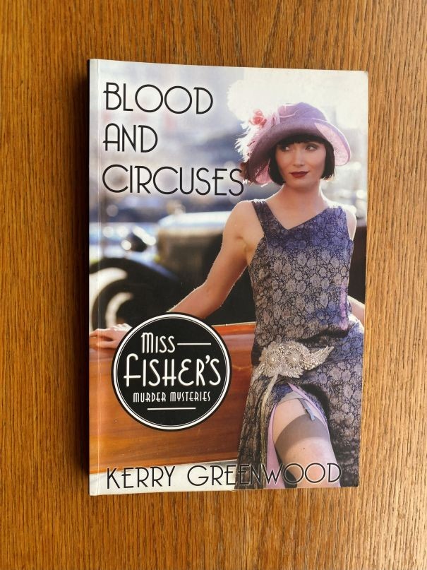 Kerry Greenwood Blood and Circuses US Reprint ed Miss Fisher’s Near Fine