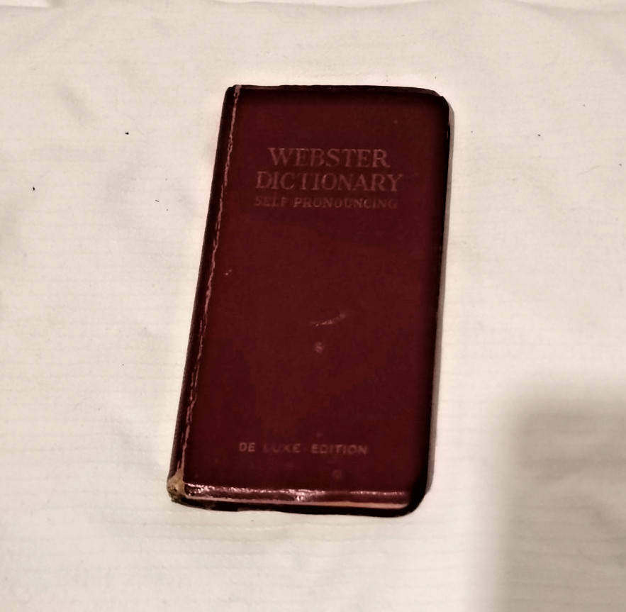 Webster dictionary, vest pocket mini, red, 5.5 inches by 2.5 inches