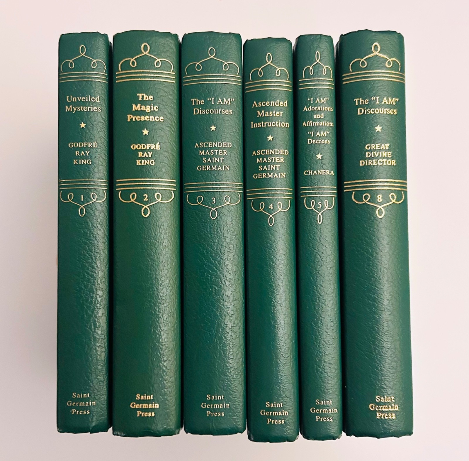 Lot of six Saint Germain Press (Green) Books 1—5 plus 8, Hardcover