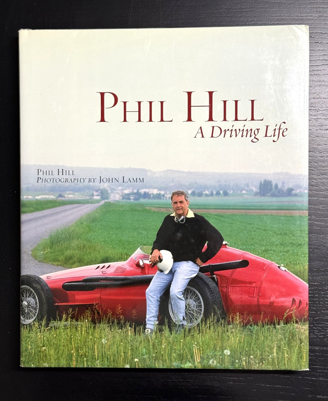 Phil Hill: A Driving Life, SIGNED by Photographer John Lamm, 1st Ed. 1st Pr.