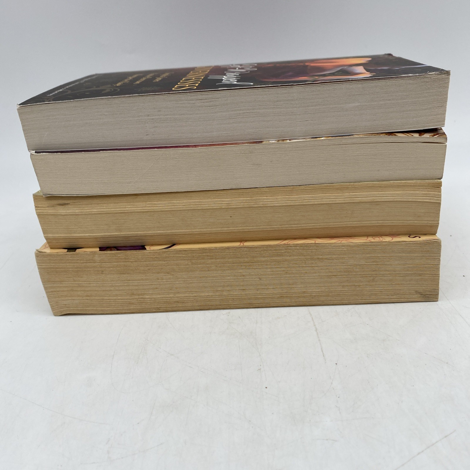 Lot of 4 Omnibus Editions Romance Trade Paperback Novels 12 Stories -Description