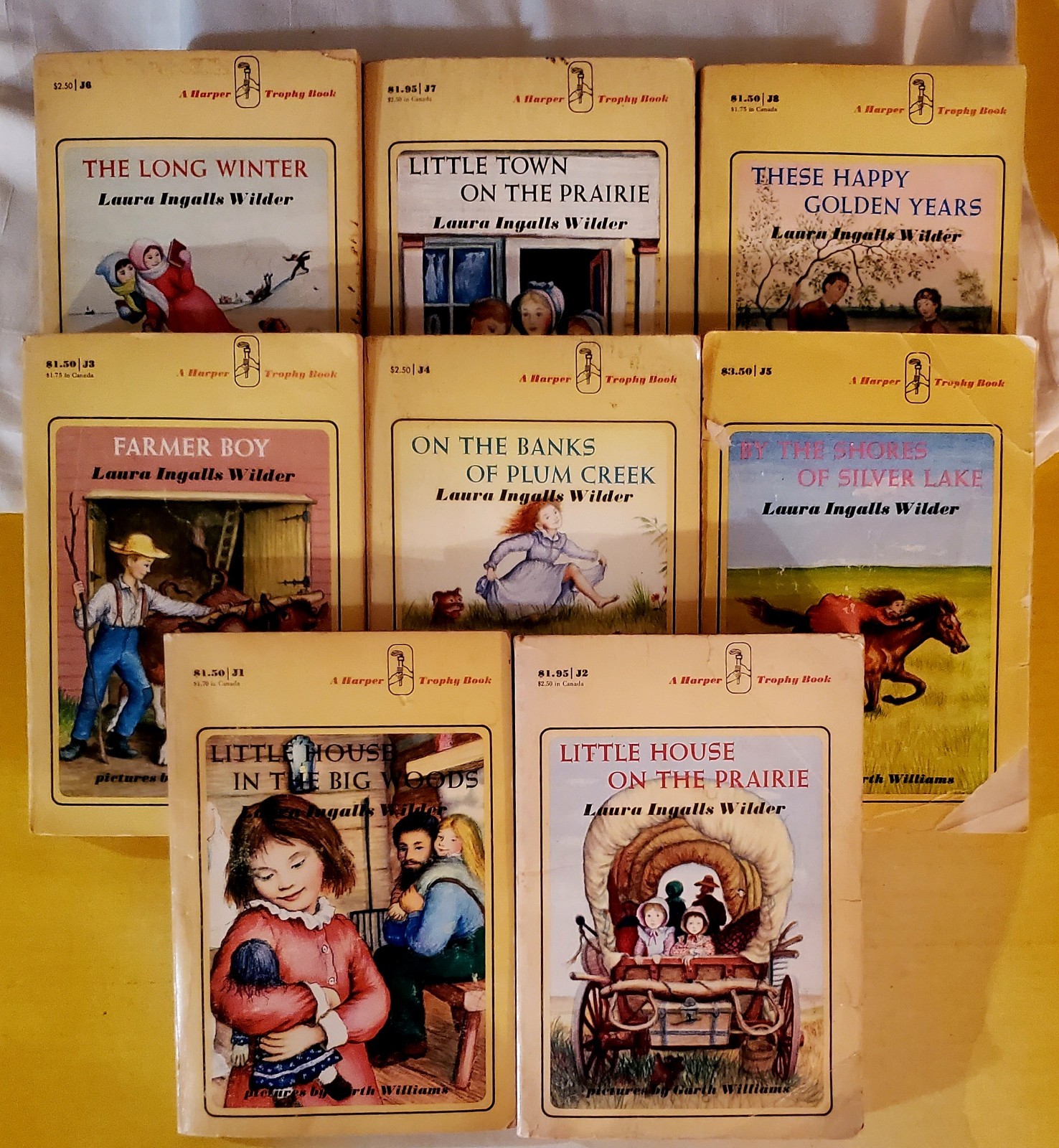 VINTAGE LITTLE HOUSE SERIES FIRST 8 BOOKS JI-J8 USED. BY LAURA INGALLS WILDER.